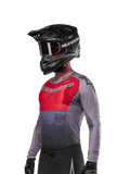 Alpinestars 2024 Supertech Dade Jersey, Motocross Jersey, Iron Red Berry and Gray, long sleeve with laser-cut perforations, worn by rider with black helmet and gloves, pro-level athletic racing fit