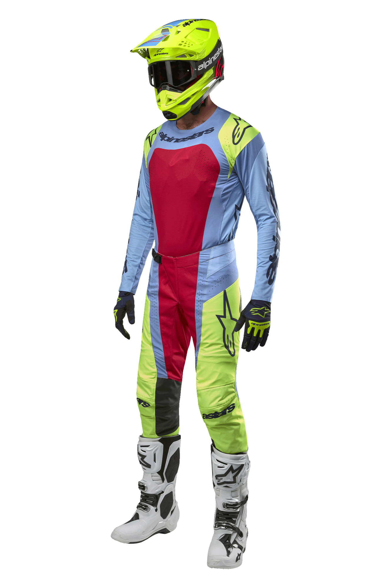 Motocrossförare klädd i Alpinestars 2024 Techstar Ocuri-byxor i ljusblått, neongult och rött, komplett racingutrustning med matchande tröja, neongul hjälm och vita stövlar, frontvy av tävlingsoutfit för terrängkörning.