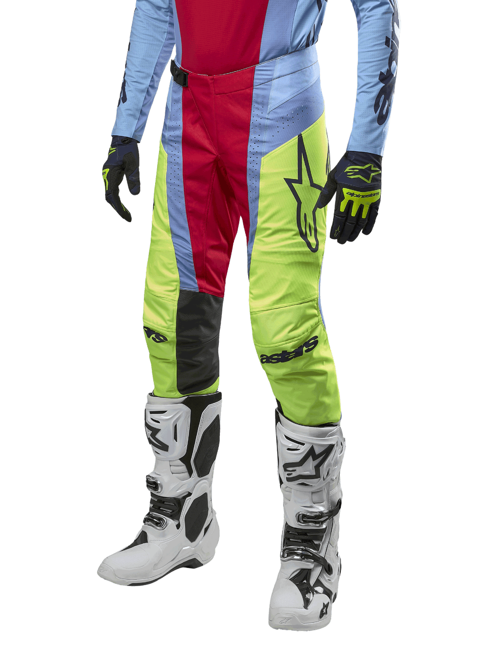 Alpinestars 2024 Techstar Ocuri byxor, motocrossbyxor, ljusblå, röda och neongula, bärs med matchande utrustning och vita stövlar, med framträdande Astars-logotyp och en racingpassform.