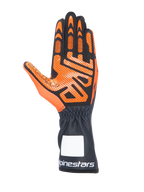 Alpinestars Tech-1 K V3 kartinghandskar, svarta och orangea, vy av handflatan som visar detaljerat silikongreppsmönster, lång mudd med vit Alpinestars-logotyp, ergonomisk design för karting