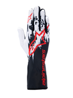 Alpinestars Tech-1 K V3-handskar, kartinghandskar, svart, vit och röd, med ett vitt och svart stänkmönster på ovansidan, stor röd Alpinestars-logotyp, röd branding på den långa kragen, professionell motorsportutrustning
