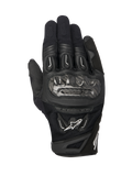 Alpinestars SMX-2 Air Carbon V2-handskar, svarta motorcykelhandskar, vy ovanifrån som visar knogskydd i kolfiber, ventilerande 3D-mesh och läderpaneler, vit Alpinestars-logotyp och kort manschettdesign