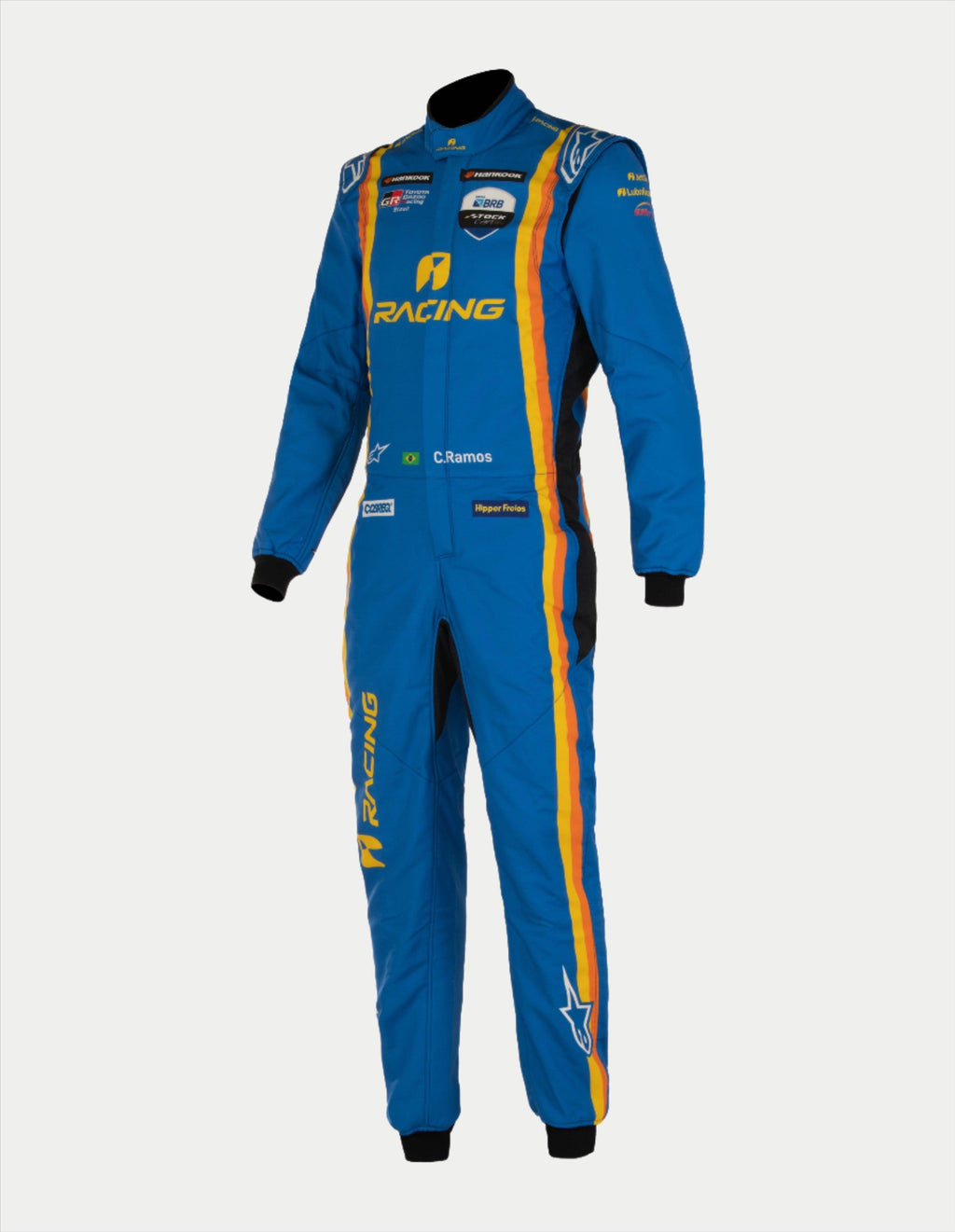 Alpinestars Tech Vision V3 skräddarsytt ställ med anpassad längd, blå och gul racingoverall för bilsport, FIA-certifierad Nomex med sponsorlogotyper och vertikala ränder