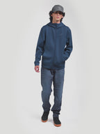 Alpinestars Cypher Hoodie, Men's Zip-Front Sportswear Hoodie, Steel Blue, features a high-neck mesh-lined hood and tri-blend double-face fleece, shown on model with motorsport-inspired styling for everyday casual wear.