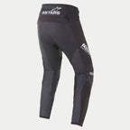 Alpinestars 2021 Techstar Phantom Pants, Motocross Pants, Black and White, rear view featuring white ASTARS branding on the waistband and side thigh, charcoal textured mesh panels on the legs, and a performance race fit design.